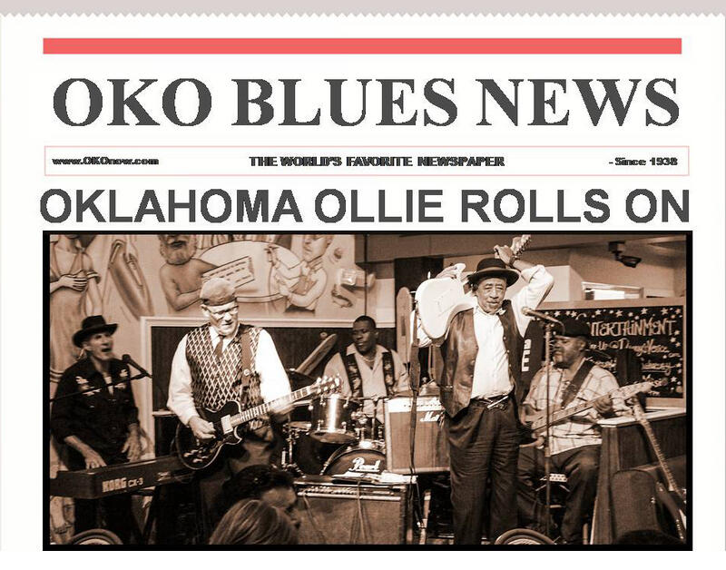 Oklahoma Ollie performing his signature behind-the-back guitar trick